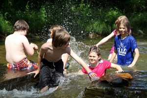 Children splash in North Carolina's Watauga River