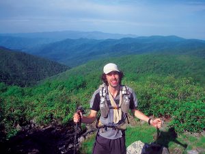 Matt Kirk stands at Rocky Top on the Appalachian Trail while thru hiking SALT. Photo courtesy Matt Kirk