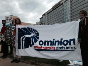 Activists and shareholders concerned with Dominion's negligence on climate change converged on the utility's annual meeting yesterday. Photo by Chesapeake Climate Action Network.