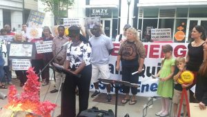 Residents impacted by coal ash join together with concerned citizens to rally outside the annual Duke Energy shareholder’s meeting in Charlotte on May 7. Photo courtesy of NC WARN