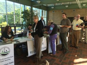 Citizens register to make comments at the public hearing in Big Stone Gap, Va. Photo by Kendall Bilbrey 