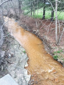 Acid mine drainage from a coal mine flooded into Pine Creek in eastern Kentucky, killing wildlife and raising concerns over drinking water safety. Photo by Tarence Ray
