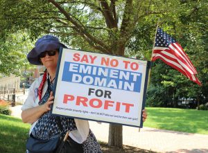 A participant in the July March on the Mansion. Photo courtesy of Chesapeake Climate Action Network 