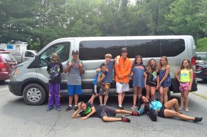Campers with the Western Youth Network in Boone, N.C., pose with the organization’s new vehicle, nicknamed the Spaceship. Photo courtesy Western Youth Network 
