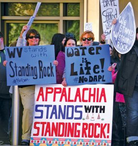 More than 200 people opposed to the pipeline rallied outside an Army Corps office in Huntington, W.Va. Photos by Chad Cordell