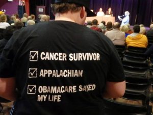 The back of forum attendee Matt Skeens' t-shirt has a clear message. Photo by Maxine Kinney