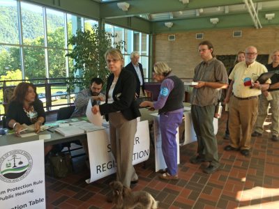 Citizens sign up to speak at a public hearing on the Stream Protection Rule in Big Stone Gap, Va., where clean water advocates argued for stronger protections and coal industry representatives relied on deception to rally against the rule.