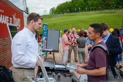 Blake Southerland of Ecological Energy Systems in Bristol (l) and Lorenzo Rodriguez of Big Stone Gap talk about opportunities in the solar industry. 