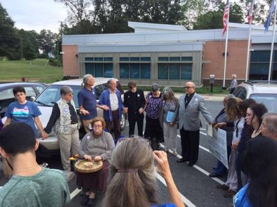 Pastor Paul Wilson of Buckingham County leads a prayer circle before a supervisor meeting on the proposed Atlantic Coast Pipeline