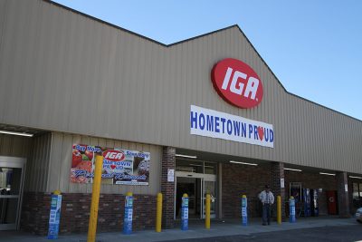 IGA store with sign reading Hometown Proud