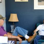 Two men sitting in conversation