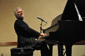Leavell loves both his trees and his piano, which he would not have without trees. Photo by Roger Gupta.