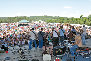 Playing to the crowd at the 2010 FloydFest. Photo by Russ Helgren.