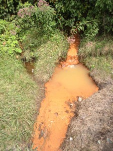 Photo of orange iron discharge