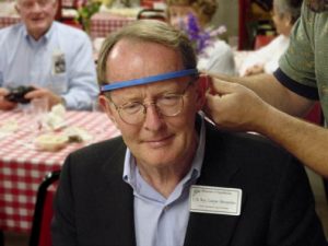 The Tea Party measures Senator Lamar Alexander's congressional competence. Or is he being fitted for a hat? 