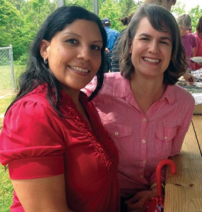 Danielle Bailey-Lash (left) sits with her childhood friend Caroline Armijo at a recent paddle and picnic event to raise awareness about coal ash in the Belews Creek community. The friends are both featured in Appalachian Voices' new video "At What Cost?" Hear their stories about living with coal ash at appvoices.org/coalash