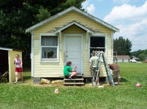 Between 400 and 500 people come to do service work each year for up to 40 families. Photos courtesy Appalachian South Folklife Center