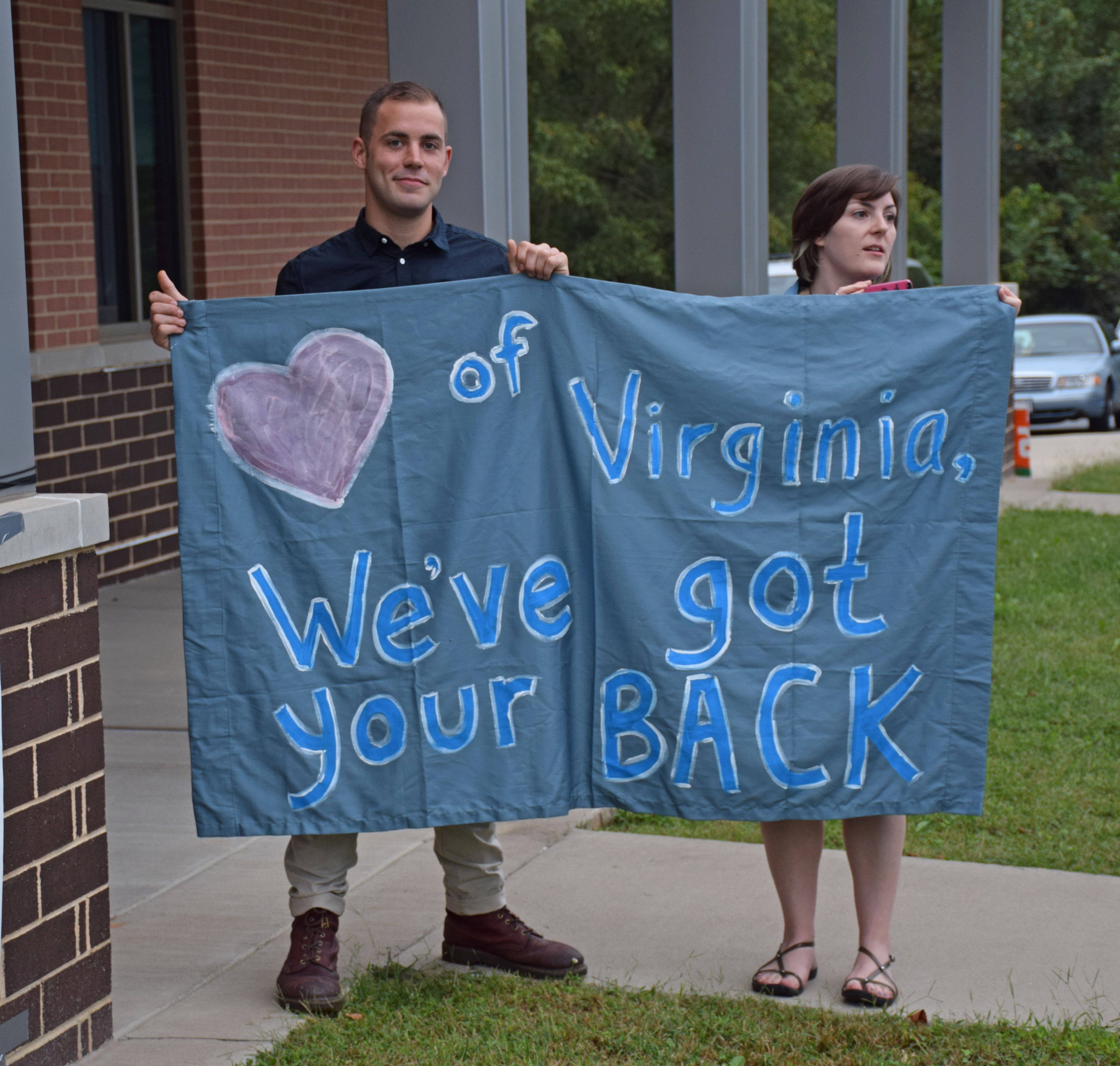Allies from Richmond hold up a supportive message to Buckingham County: Heart of Virginia, we’ve got your back.”