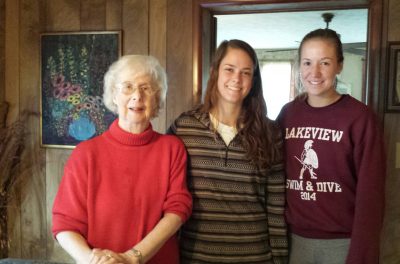 Watauga County resident Lydia Head with volunteers Sarah Merlotte and Hannah Emery (not pictured: Taylor Petty) Photo: Katie Kienbaum