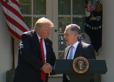 President Donald Trump shakes hands with EPA Administrator Scott Pruitt after announcing the United States will leave the Paris Climate Accord.