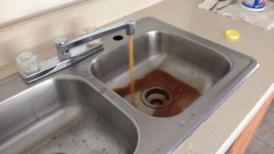 Rust-colored water coming out of tap