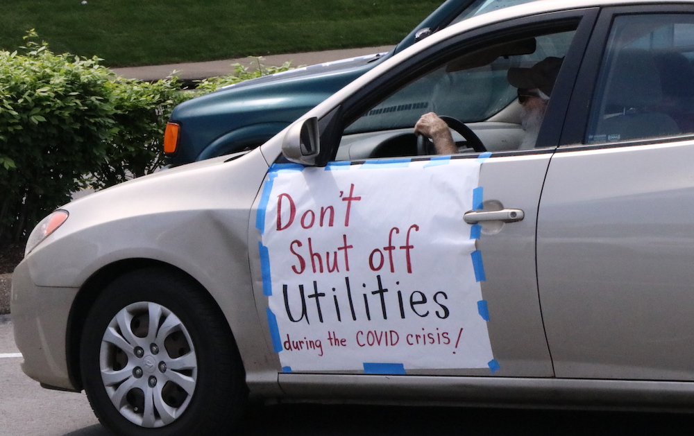 protester in car
