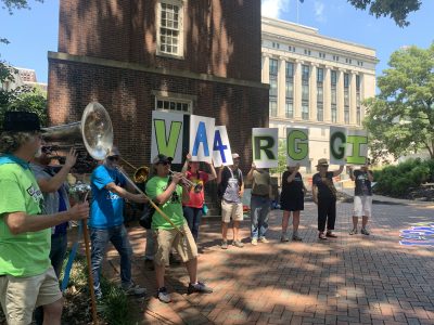 Marchers rallied support for Virginia's continued participation in the Regional Greenhouse Gas Initiative. Photo by Jen Lawhorne