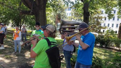 A brass band helped liven the scene during the march. Photo by Jessica Sims