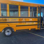 A Kanawha County school bus fills the photo.