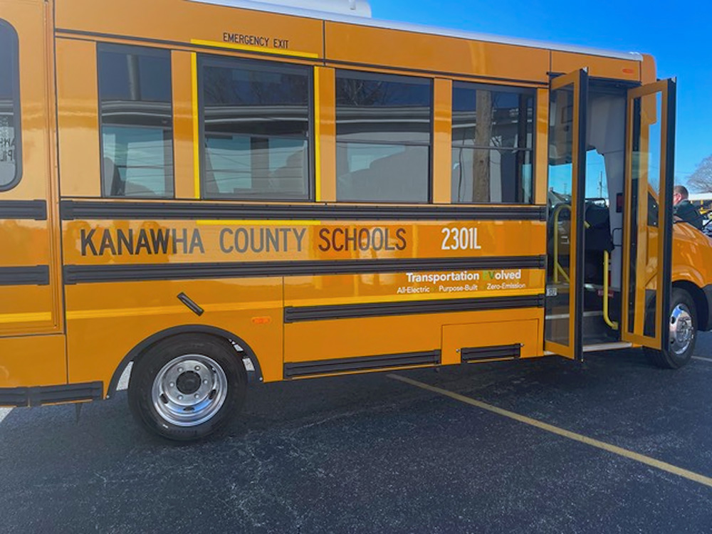 A Kanawha County school bus fills the photo.
