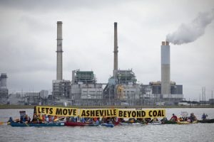 On back-to-back days this week, the Asheville City Council approved a clean energy resolution, and the N.C. Department of Environment and Natural Resources ordered Duke Energy to provide drinking water to a family whose well water was contaminated by coal ash from Duke's Asheville Steam Station. Photo by the Sierra Club.