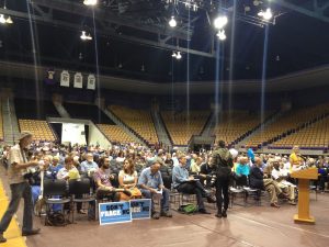 Hundreds of concerned citizens wait for the hearing to begin.