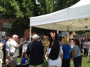 Speakers Denise DerGarabedian (founder of the Coalition Against Fracking in WNC), Amy Adams, Susan Leading Fox, and Mayor Baughn stand in front of the anti-fracking crowd.