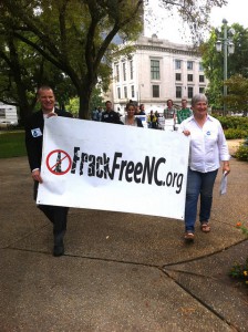 Dave Rogers of Environment North Carolina and Hope Taylor of Clean Water for North Carolina lead the procession to the governor’s office.