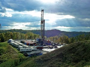 A gas drilling rig was built on David Wentz's land in Doddridge County, W. Va., without his permission, a legal phenomenon that is increasingly widespread in areas such as the Marcellus shale region. Photo by Diane Pitcock, <a href=
