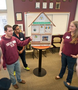 Virginia Tech students explain sustainable building practices to high school students. Photo courtesy of Virginia Tech