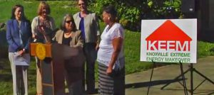 Knoxville Mayor Madeline Rogero (at podium) launches KEEM with homeowner Dorothy Ware (far right), who has already saved 25 percent on her electric bill, with more energy efficiency improvements to come.