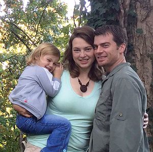 Amy Kelly (center) with husband Lyle and daughter Aidia.