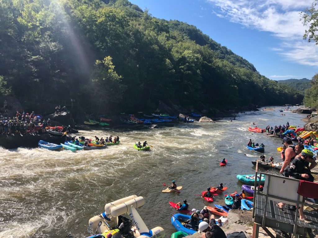  Kayakers and rafts from around the country enjoying the Gauley River National Recreation Area, downriver from South Fork Coal Company's mines in the Yew Mountains of Greenbrier County. Photo by Andrew Young