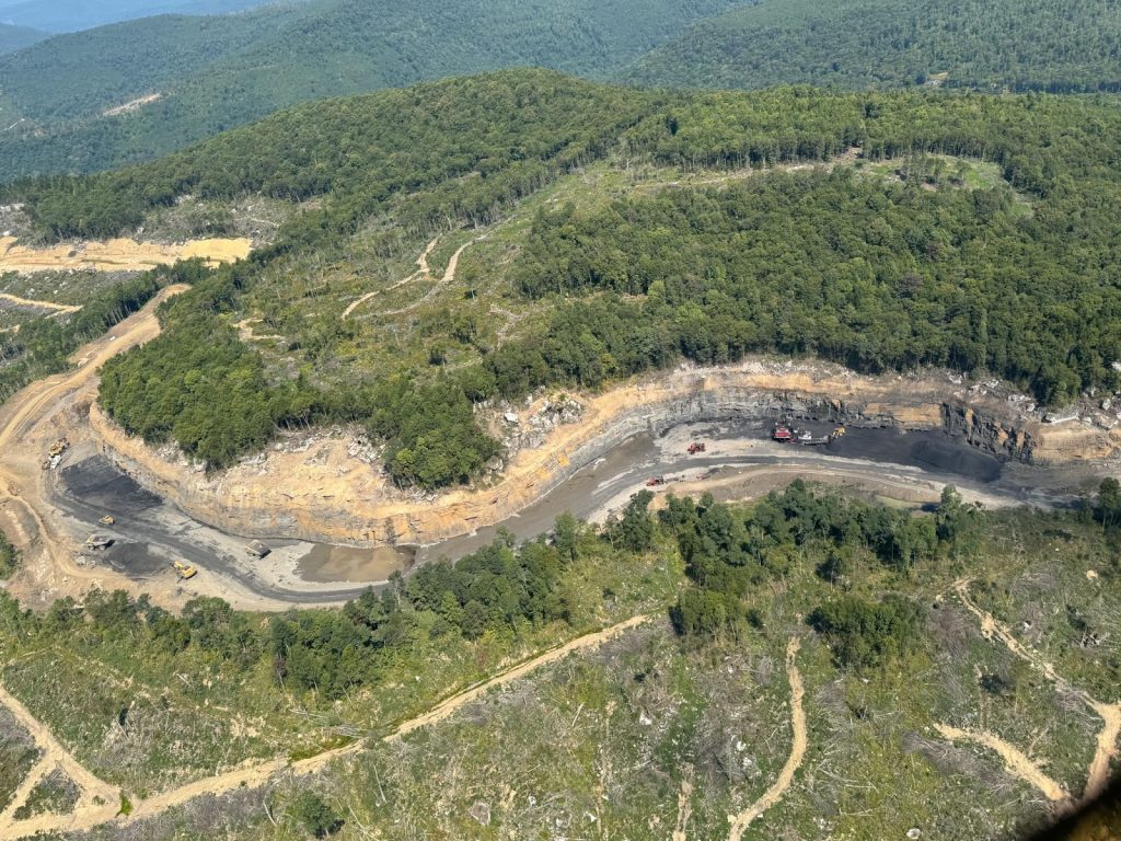 South Fork Coal Company's Rocky Run Surface Mine cutting a gash into the Yew Mountains above the South Fork Cherry River and the community of Richwood. Photo by Andrew Young/ Southwings