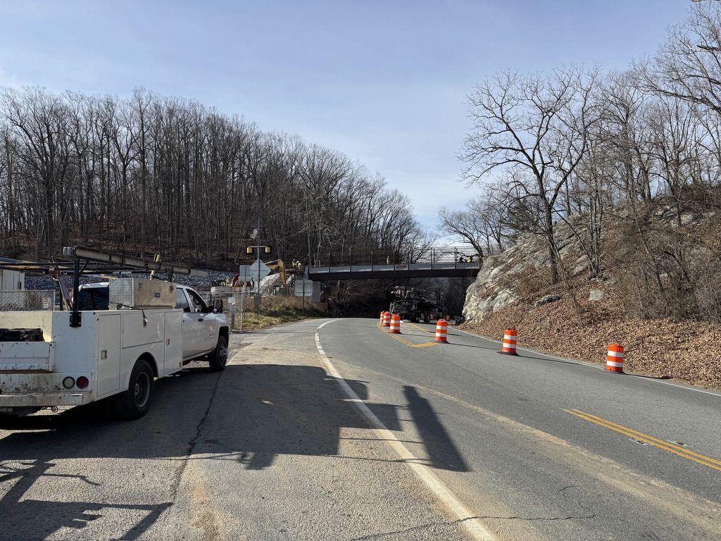 Photo of McAfee Knob trailhead pedestrian bridge from afar,