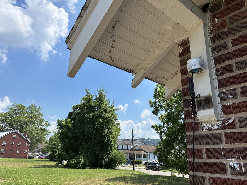 A PurpleAir monitor on the back porch of West Virginia Citizen Action Group’s office in Charleston. Photo by Joe Severino