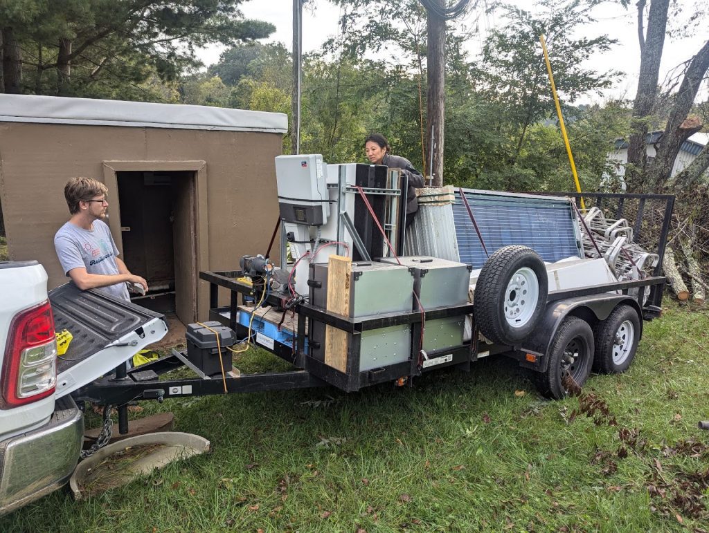 Footprint Project Founding Director Will Heegaard and Program Director Jamie Swezey load solar panels and other sustainable equipment into a trailer in North Carolina. “The international humanitarian space is still way ahead of us in disaster response in terms of momentum towards holistic sustainability, really thinking about your fossil fuel supply chains, transportation networks, plastics in refugee camps,” says Heegaard. “There's a ton of incredible work being done around the world to do aid better. There's just no reason why we can't do it here.” Photo courtesy of Footprint Project