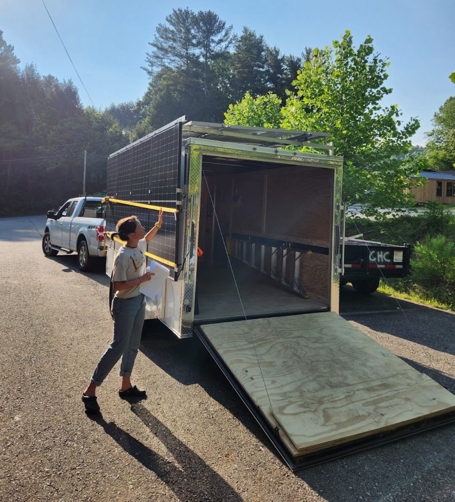 In June 2025, ROAR received its solar-powered trailer from Footprint Project. A member of the Footprint Project team teaches ROAR and allied organizations on how to use the trailer. Photo by Matt Wallace