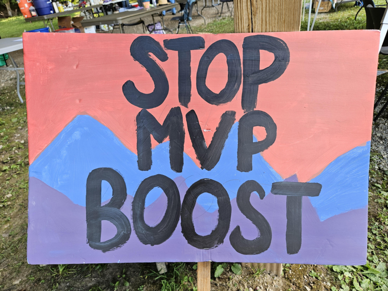 Signage that reads "Stop MVP Boost" at a recent community event in Giles County, Virginia. Photo by Jessica Sims