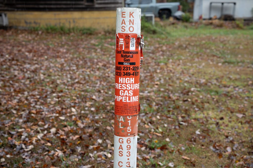 Methane gas pipeline marker for an East Tennessee Natural Gas line. “Normal people don't have the resources to take them to court,” says Amy Sexton about Enbridge, later adding, “We didn't want to go to court. We didn't want to have this fight.” Photo by Abby Hassler, Appalachian Voices