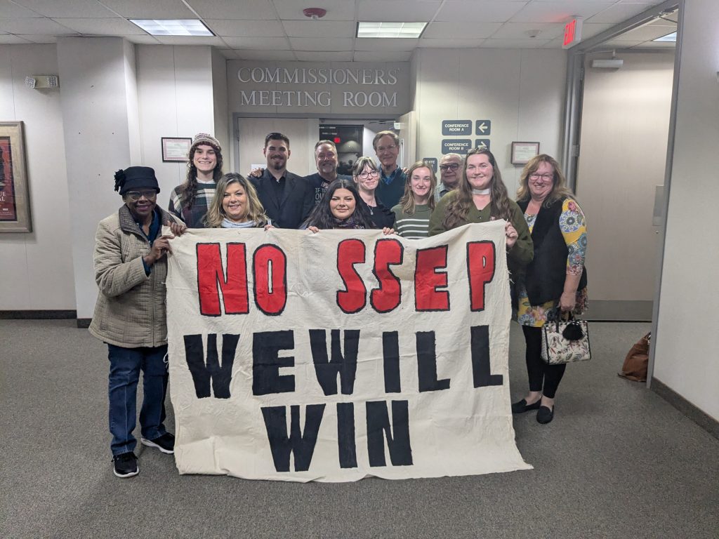 Community members and advocates at the Davidson County Governmental Center after the Board of Commissioners passed the resolution.
