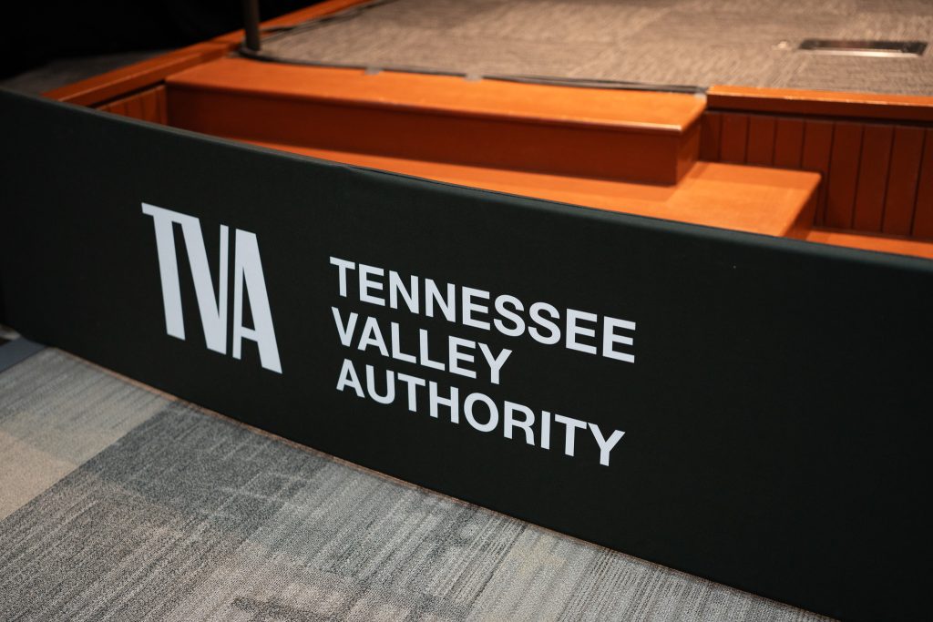 TVA banner at a TVA board listening session in 2025