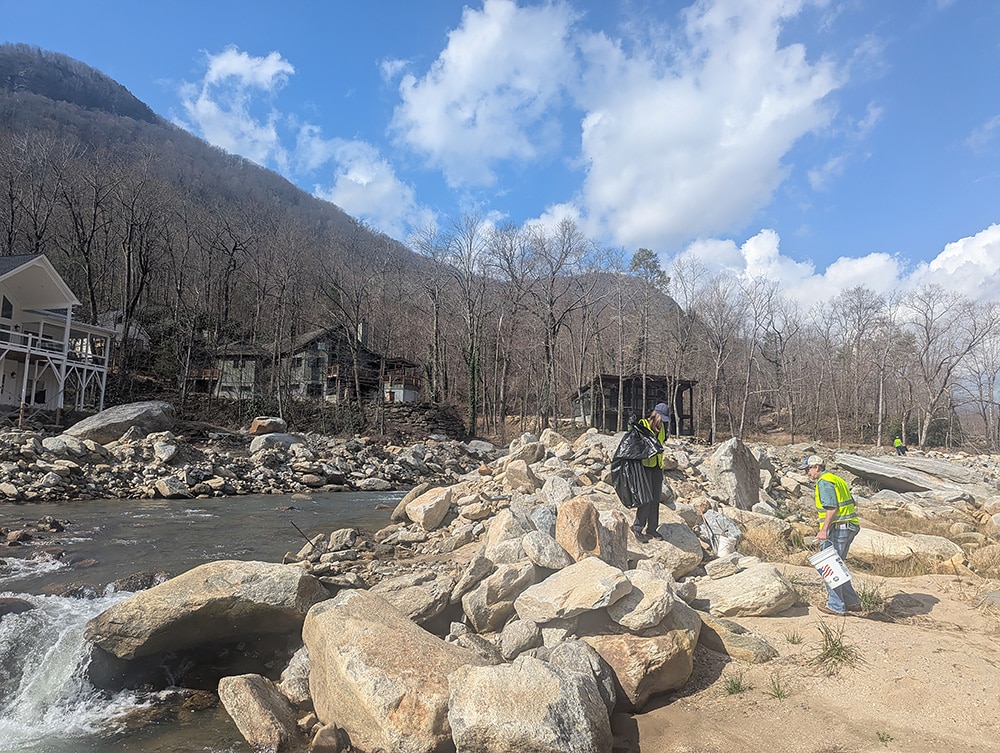 A crew of volunteers works with Broad Riverkeeper David Caldwell to clean up trash along the Rocky Broad River