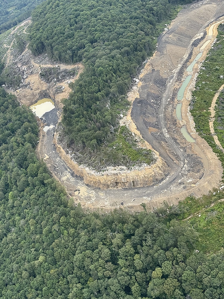 South Fork Coal’s Rocky Run Surface Mine lies within the Monongahela National Forest’s proclamation boundaries, the area Congress originally established as potential national forest when the Mon was created. The mine is approximately 6 miles from Cranberry Wilderness, 2 miles from Falls of Hills Creek and within view of the Fork Mountain Trail.